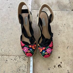 Black and Red Wedge Shoes with Vibrant Design